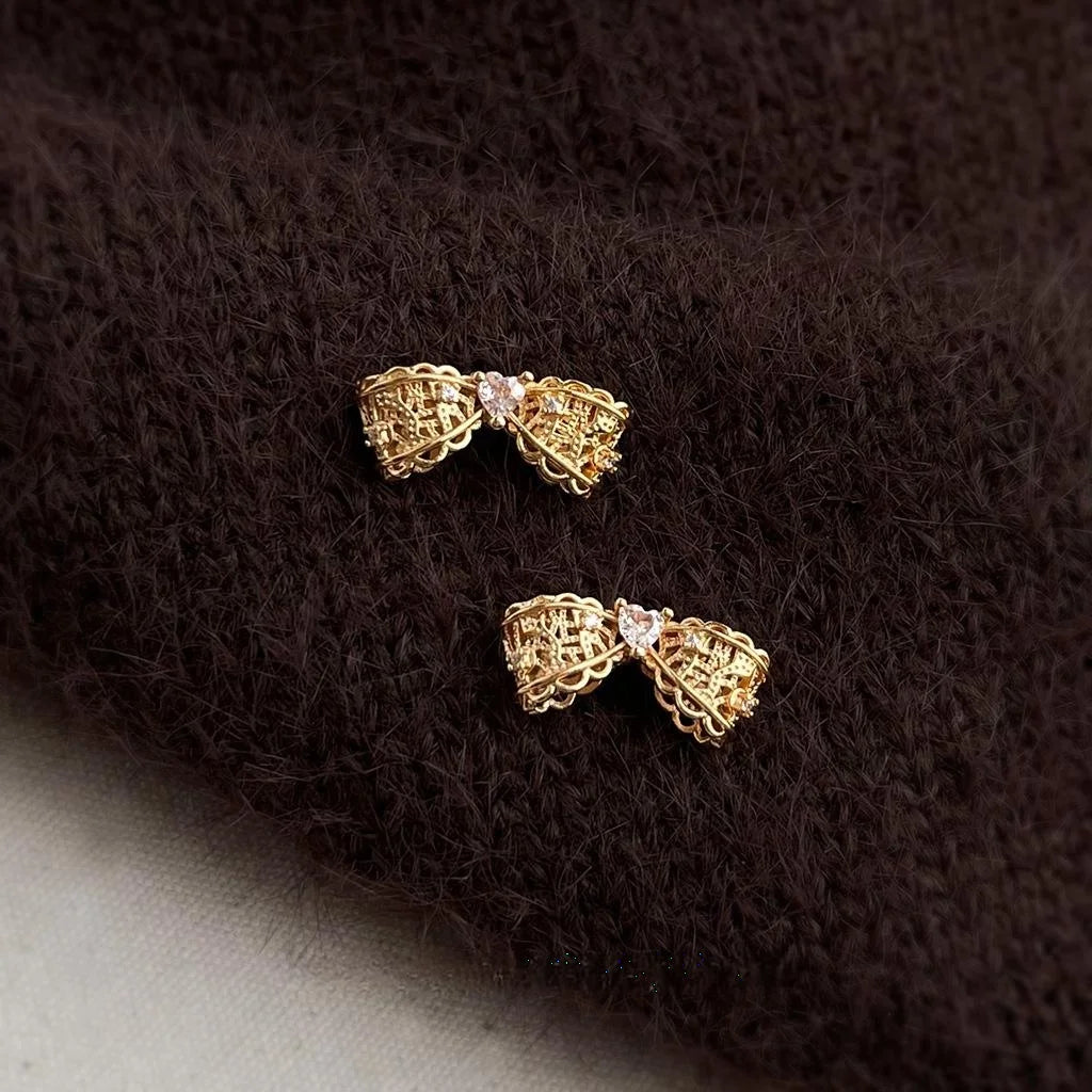 Old Money Style Copper Zircon Heart Bow Stud Earrings With Silver Plated Pins And Hollow Lace Design