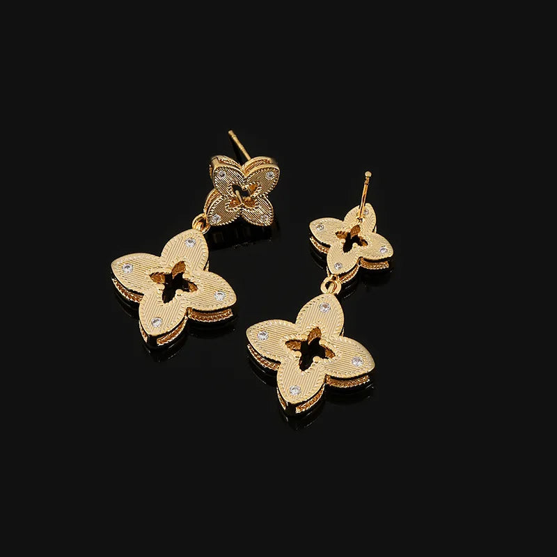 Elegant Gold Alloy Hollow Four Leaf Clover Rhinestone Dangle Stud & Clip On No Piercing Earrings
