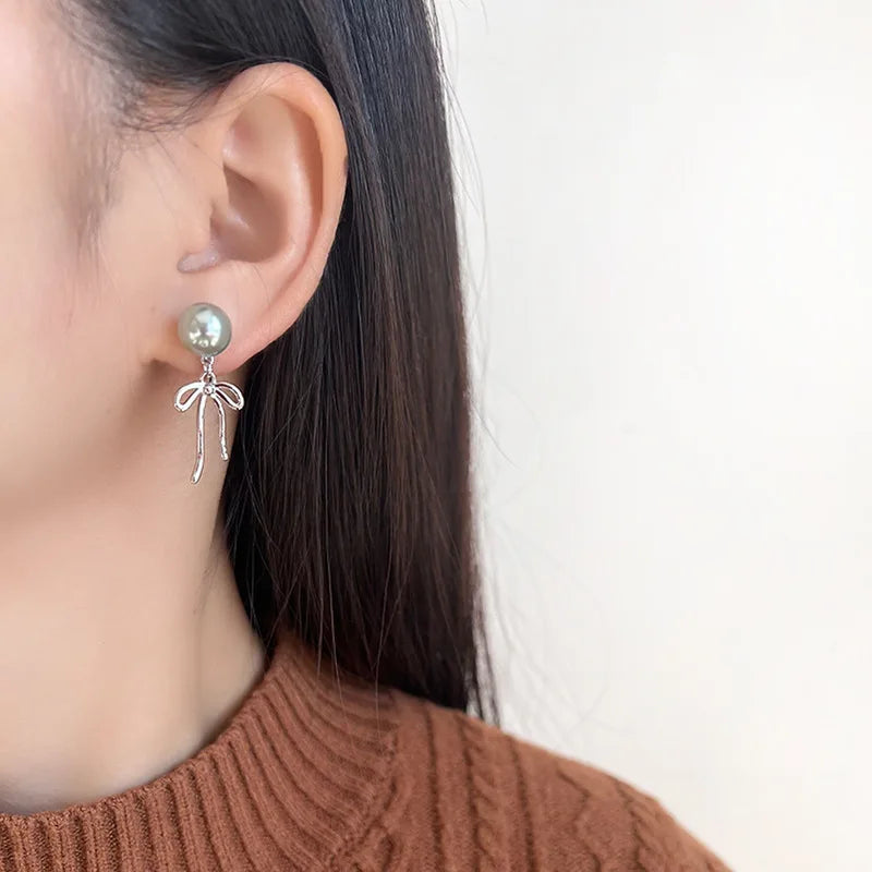 Elegant Sweet Pearl Bowknot Long Tassel Alloy Spiral Disc Stud & Clip On No Piercing Earrings