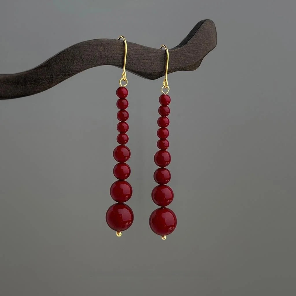 Hepburn Style Red Glass Pearl Tassel Drop Earrings With Copper Geometric Design
