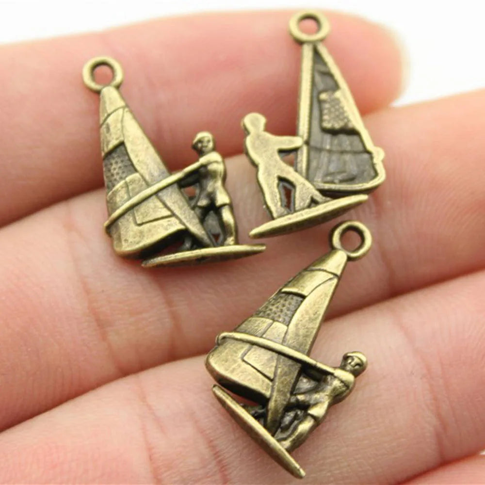 22x14mm 1.2g Antique Bronze Tone Zinc Alloy Sailing Athlete Sailboat Charm Pendant for Sports Jewelry DIY