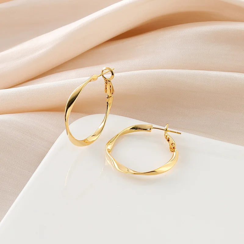 Elegant Gold Alloy Twisted Wave Hoop Stud & Clip On No Piercing Minimalist Commuter Circle Earrings