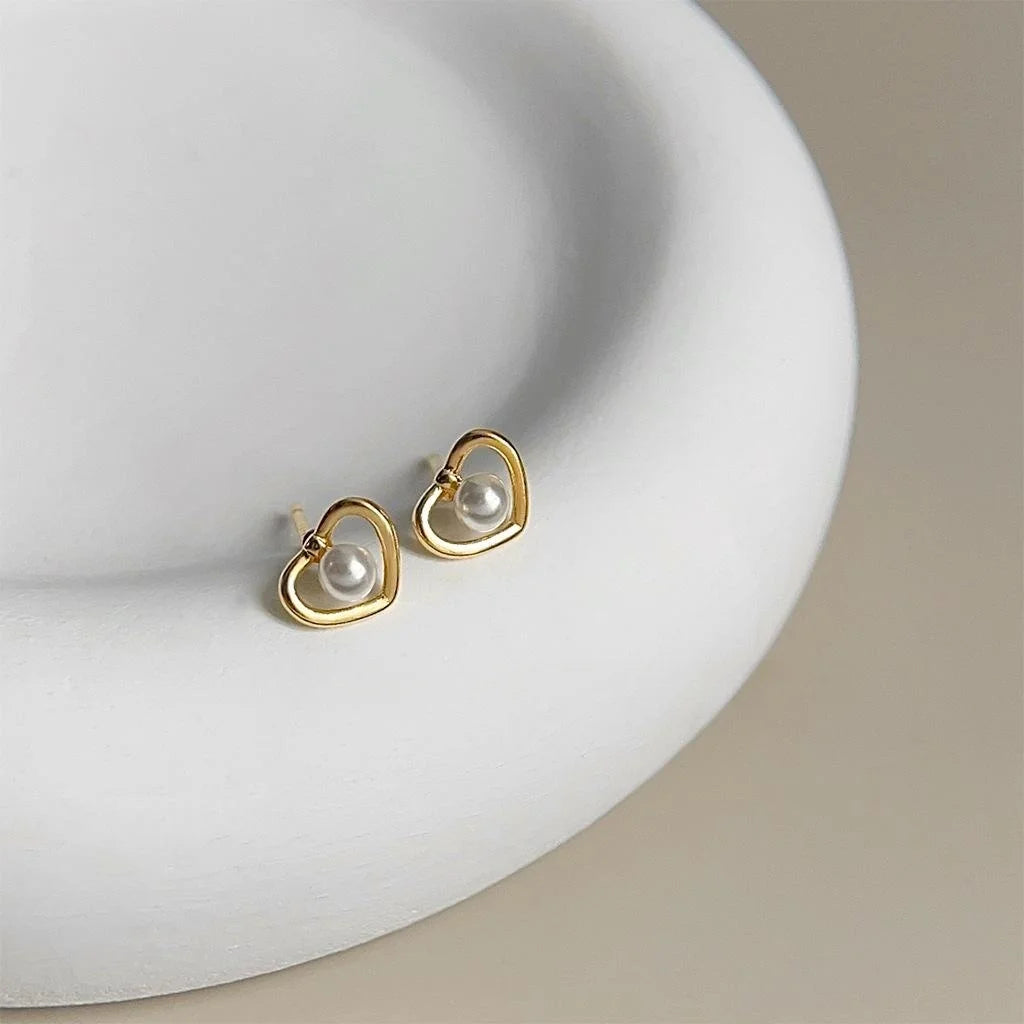 Minimalist Hollow Heart Pearl Stud Earrings With High Luster Pearl And Silver Plated