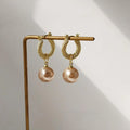 Light Luxury Champagne Gold Alloy Pearl Twist Hoop Earrings French Vintage Geometric Jewelry