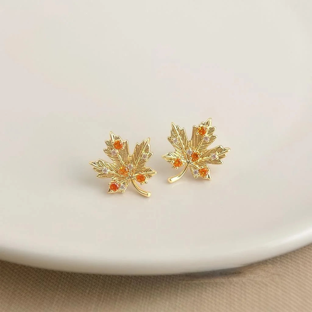 Designer Maple Leaf Micro Pave Zircon Copper Stud Earrings, Elegant Fall Style