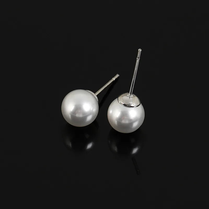 Elegant Round White Pearl Alloy Stud & Clip On No Piercing Silicone Clip Women's Fashion Earrings