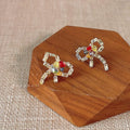 Micro Pave Zircon Bow Stud Earrings 14K Gold Plated Copper Handmade Designer Jewelry