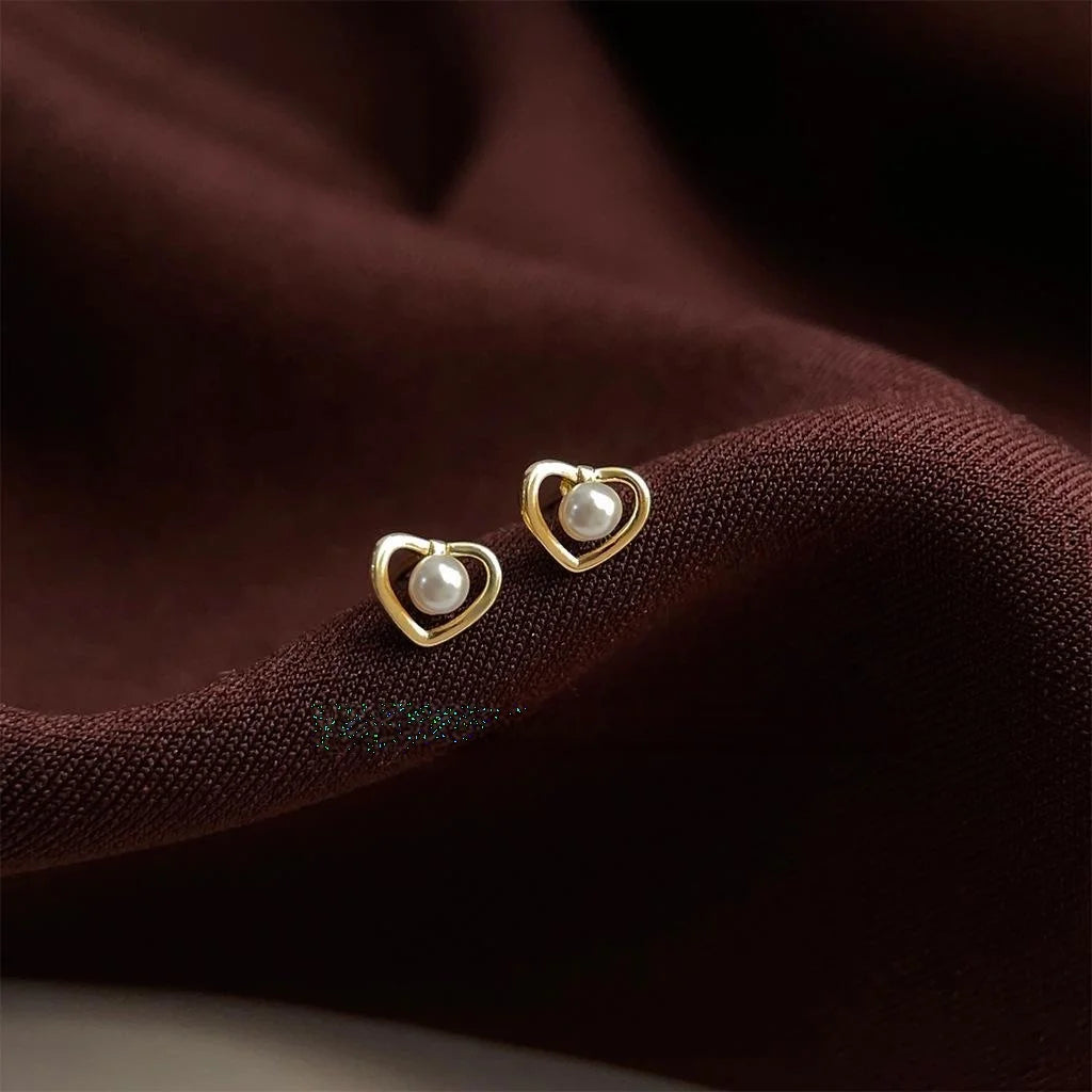 Minimalist Hollow Heart Pearl Stud Earrings With High Luster Pearl And Silver Plated