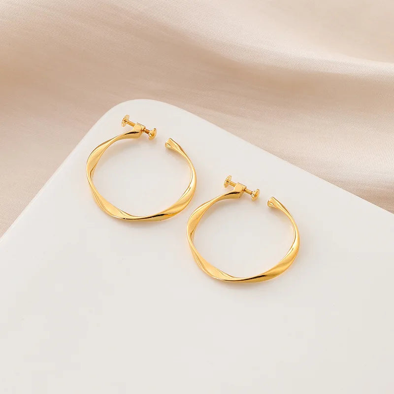 Elegant Gold Alloy Twisted Wave Hoop Stud & Clip On No Piercing Minimalist Commuter Circle Earrings