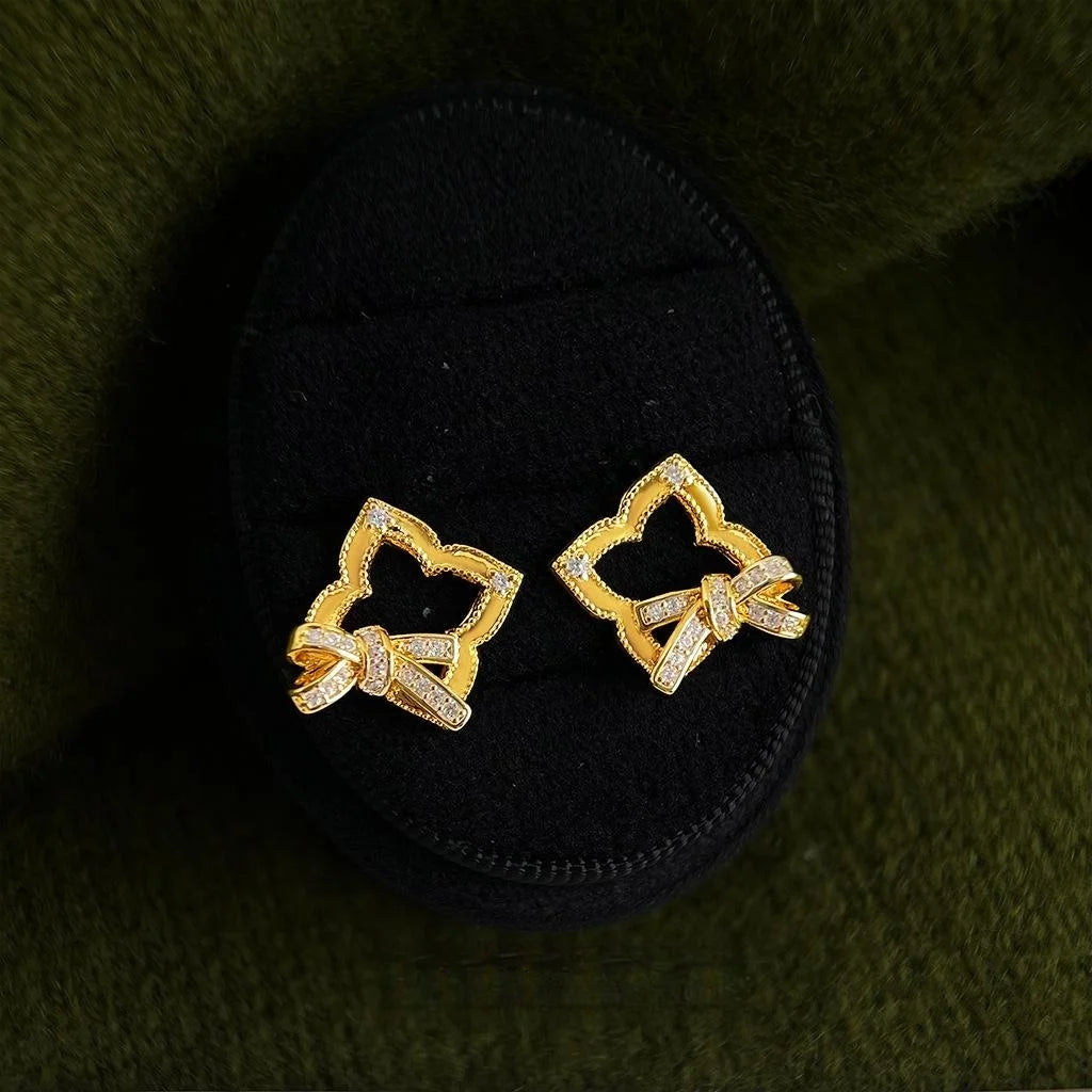 Light Luxury Micro Pave Zircon Hollow Geometric Bow Copper Stud Earrings With Silver Plated Pins