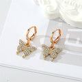 Gold Tone Crystal Butterfly Necklace and Huggie Earrings view 2