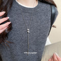 Crystal S Pendant Lariat Necklace with Distinctive Textured Details view 3
