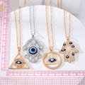 Gold and Silver Tone Crystal Evil Eye Pendant Necklaces in Four Styles view 5