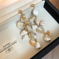 Gold Tone Long Drop Earrings With Irregular Shell Like Pieces view 6