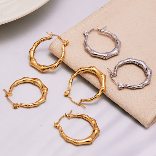 Display view of bamboo ridge hoop earrings in main image 1.