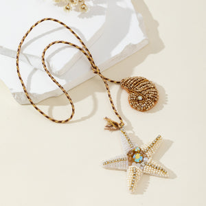 Beaded Starfish And Shell Pendant On Braided Cord Necklace