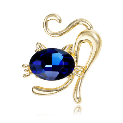 Front product view of the cat brooch pin in gold and blue