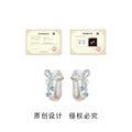 Silver Tone Bow White Potion Bottle And Blue Stone Stud Earrings view 3