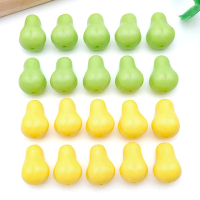 Green bead beads arranged on a light background