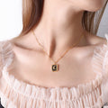 Square Moon Black Enamel Pendant Necklace Gold Steel Tone view 1