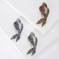 Twisted Ribbon Crystal Brooch in Blue Multicolor or Black view 1