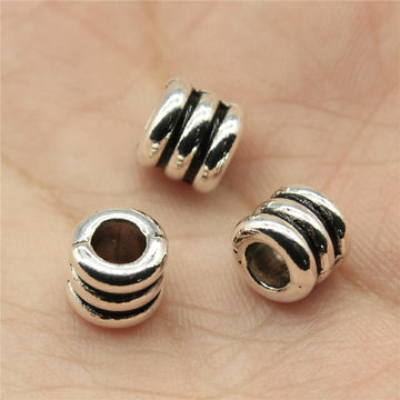 Three-Ridge Large-Hole Spacer Beads in Two Antique Finishes