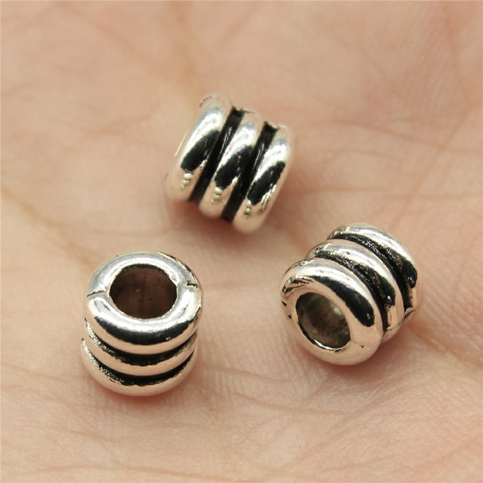 Three-Ridge Large-Hole Spacer Beads in Two Antique Finishes