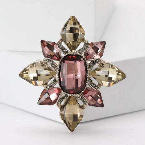eight-point crystal star brooch displayed on a product backdrop