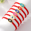 Red Woven Cord Lash Evil Eye Adjustable Bracelets in Six Colors view 1