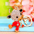 Jeweled Zodiac Cow Keychains in Pink and Red Pictured Colors view 1