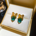 Gold Tone Crossed Bar and Cube Drop Earrings in Two Colors view 7