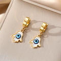 Gold Tone Mother of Pearl Evil Eye Huggie Drop Earrings view 6