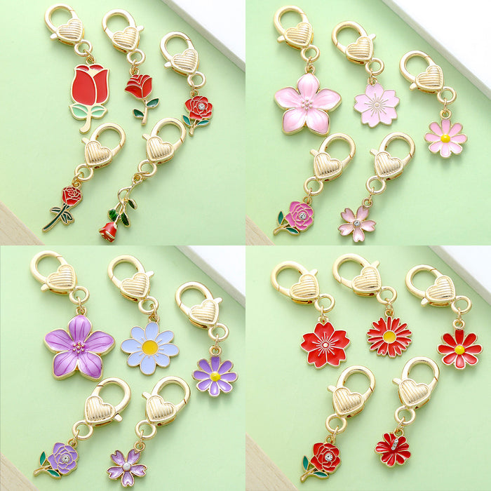 Rose, Sunflower and Daisy Charm Keychains Featuring Purple Heart Across 18 Variations