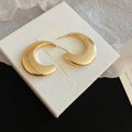 Pair of Metal Tone Wide Polished C-Shaped Hoop Earrings in Two Sizes view 9