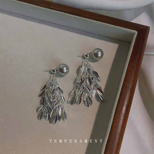 Silver-tone gray-pearl layered-leaf fringe studs in the first product display.
