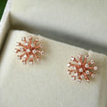 Rose Gold Tone Starburst Crystal Stud Earrings with Polished Finish view 3