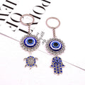 Silver Tone Turtle and Hamsa Blue Evil Eye Split Ring Keychains view 2