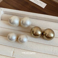 Round Pearl Look Stud Earrings in White and Bronze Tones view 1