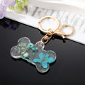 Transparent Resin Pressed Flower Dog Bone Clip Keychains in Three Colors view 5