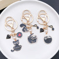 Six Black Cat Music Keychains with Instrument Motifs view 3