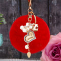 Wooden Love Heart Rabbit Fur Pom Keychains in Fifteen Pictured Fur Colors view 1
