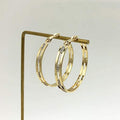 Geometric Large Hoop Earrings in Gold and Silver Tones view 1