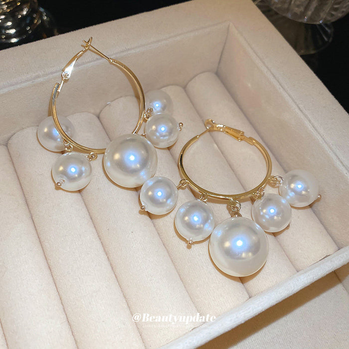 Gold Tone Hoop Earrings with Graduated White Pearls