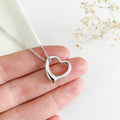 Sculpted Open Heart Pendant Necklace In Gold And Silver Tones view 2