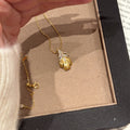 Gold Tone Textured Feather and Crystal Pendant Necklace view 3