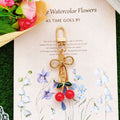Gold Bow Cherry Bead Keychains Lobster Clasp Five Colors view 10