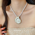 Spiral Shell Pendant Cord Necklace with Polished Metal Tone Details view 3