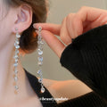 Silver Tone Crystal Strand Drop Earrings with Teardrop Ends view 2