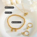 Gold Lotus Seed Pod Charm Necklace And Hoop Drop Earrings view 2
