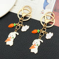 Thirteen White and Pink Rabbit Floral Metal Keychain Designs view 3